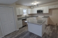 The Auburn II - Kitchen shows pantry